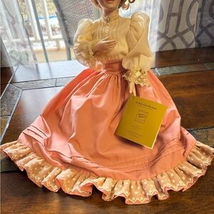 Vintage Style Porcelain Doll with Peach Dress